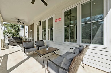 View of patio with a grill, covered porch, and ce