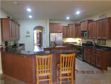 Wow! Look at this Cooks Kitchen...Chef's Delight! Tons of cabinet & counter space, all stainless appliances, center island ~