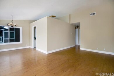 Gorgeous floors, fresh paint and vaulted ceiling!