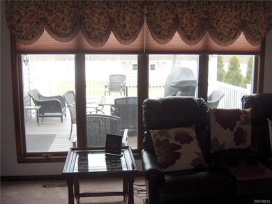 View from Formal Living Room to Deck. Shades are motor operated with remote control!