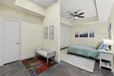 Secondary bedroom with private sitting area on way