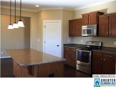 The entry hall opens up to the Kitchen, Great Room