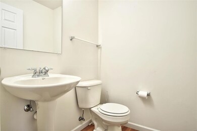 Sleek main floor powder room.