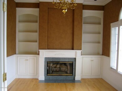 Den/Office w/FP. Maple Floors