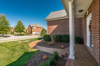 The landscaping is tastefully done and the aggregate sidewalk has been freshly sealed! Everything is so crisp and clean inside and out!
