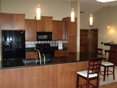 Attractive pendant lighting.  All appliances stay.