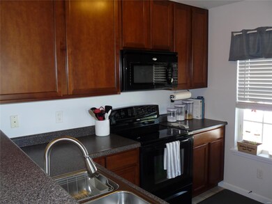 Smooth top range and built in microwave.