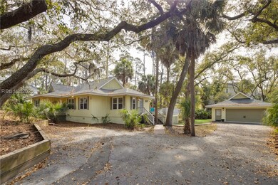 Front view of home with large & spacious driveway