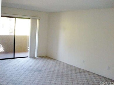Living Room, with sliding glass doors to balcony