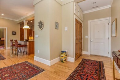 Foyer to Unit with Coat Closet