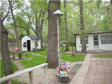 Cabin and shed and picnic area.