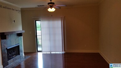 Den has beautiful hardwood floors and opens up to 