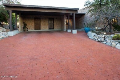 Red brick drive, double carport
