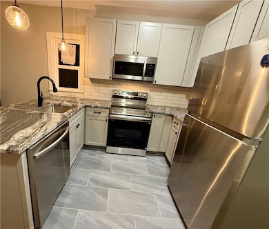 3704 Baltimore Ave unit 2N, Kansas City, MO 64111 - photo 4