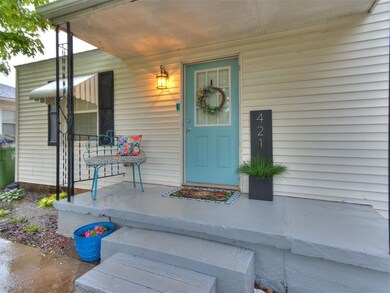 Entrance to property featuring a porch
