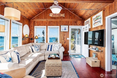 Living room with vaulted ceilings and views