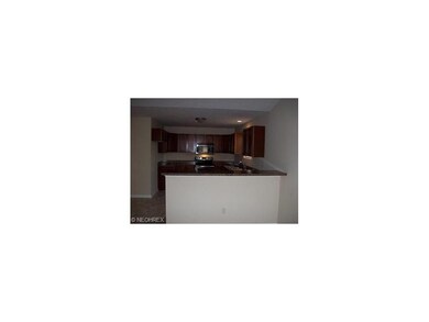 Plenty of cabinets.  Breakfast bar for extra seati