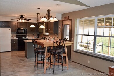 Dining in the Kitchen overlooks the Back Patio