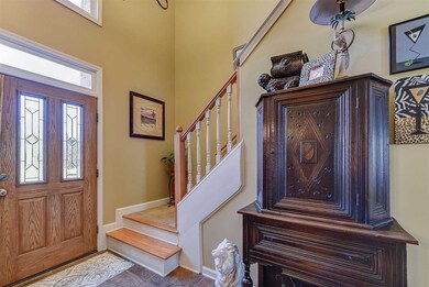 Step inside and be greeted by a 2-story foyer with