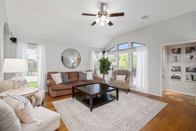 Spacious living room with lots of natural light!