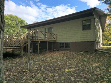 View of House with View of Egress Window