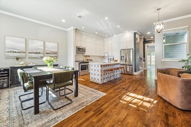 This photo showcases a bright, open-concept kitche