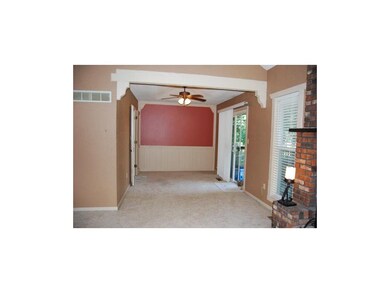 Dining room open to living room and kitchen