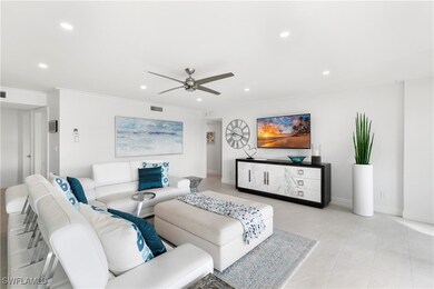 Living area featuring visible vents, baseboards, l