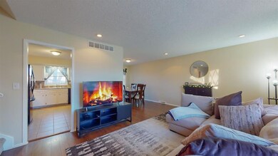 Quad level: 3 bedrooms, 2.5 baths, 2 car garage