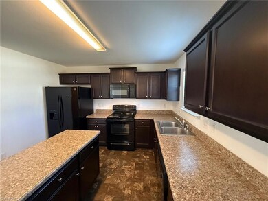 1907 Northrop Dr, Whitsett, NC 27377 - photo 7