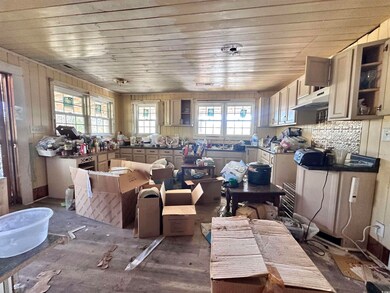 Misc room with a sink and wooden ceiling