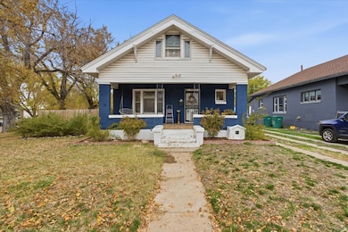 View of front of house with covered porch