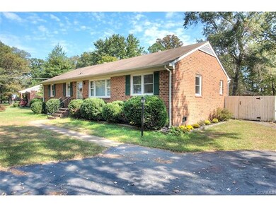 The home is situated on a corner lot and has a cir