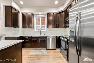 Kitchen with quartz & SS appliances
