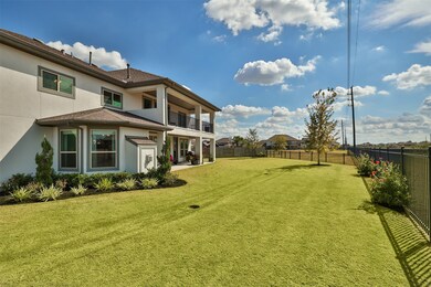 This is a two-story home with a large, well-manicu