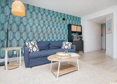 Living room featuring wood-type flooring