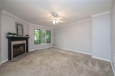 Family room with Gas FP and ceiling fan/light