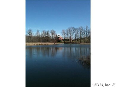 Exterior Front view from private pond which connec