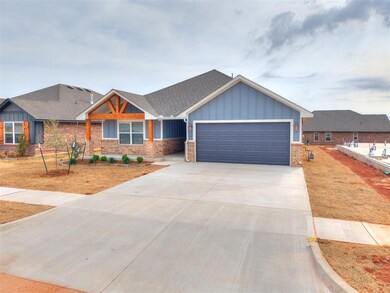 Craftsman-style home with a garage, concrete drive
