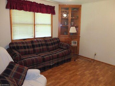 Family room with 2 built in hutches.