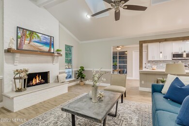 fireplace with kitchen area