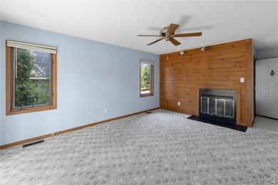 Living Room with Wood Burning Fireplace