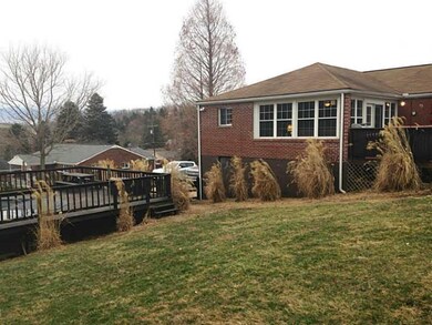 Exterior Back. View from the Yard with Pool