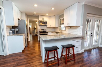 Renovated Kitchen with Granite Counter Tops