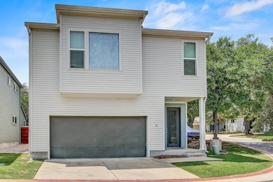 View of front of home with an attached garage and