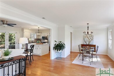 Bright open floor plan with hardwood floors.