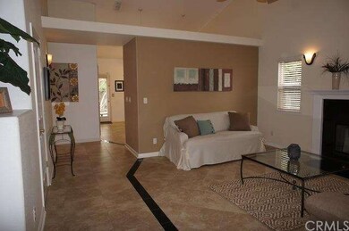 Gorgeous travertine tile with granite accent throu