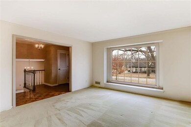 Formal living room with neutral colors.