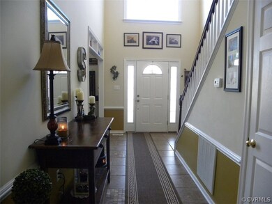 2-story foyer with designer ceramic tile, side lig