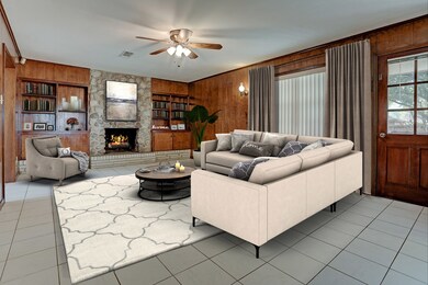 The living room is spacious.  Picture is virtually staged.